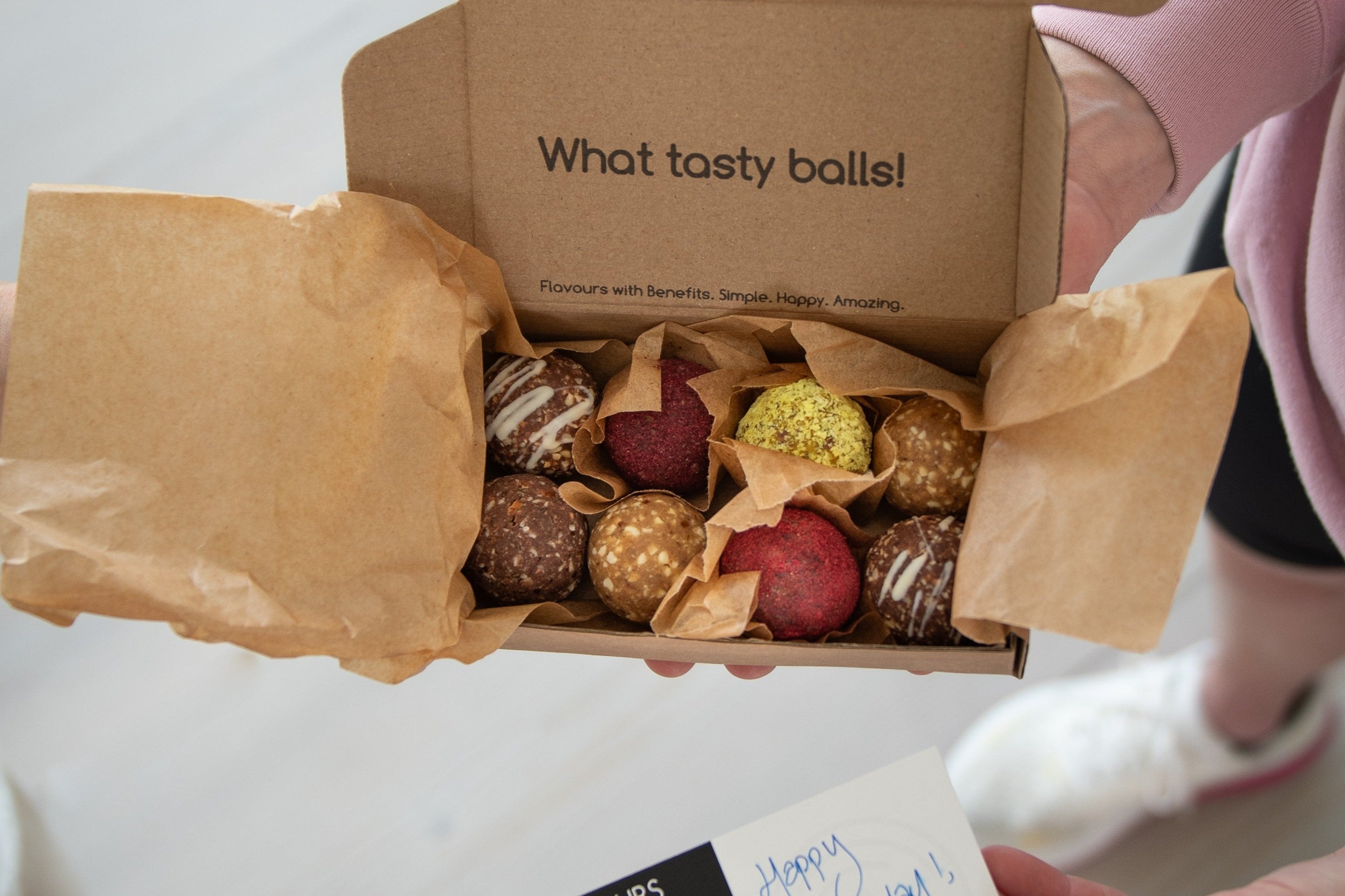 Mixed box of Claire's Amazeballs with flavours gift card with happy birthday message