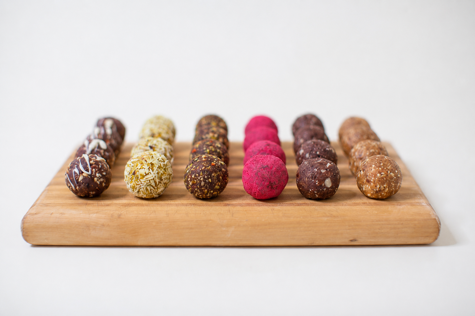 Claire with a plate full of a selection of energy ball flavours